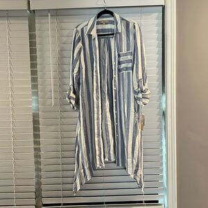 Never worn. Doesn’t fit